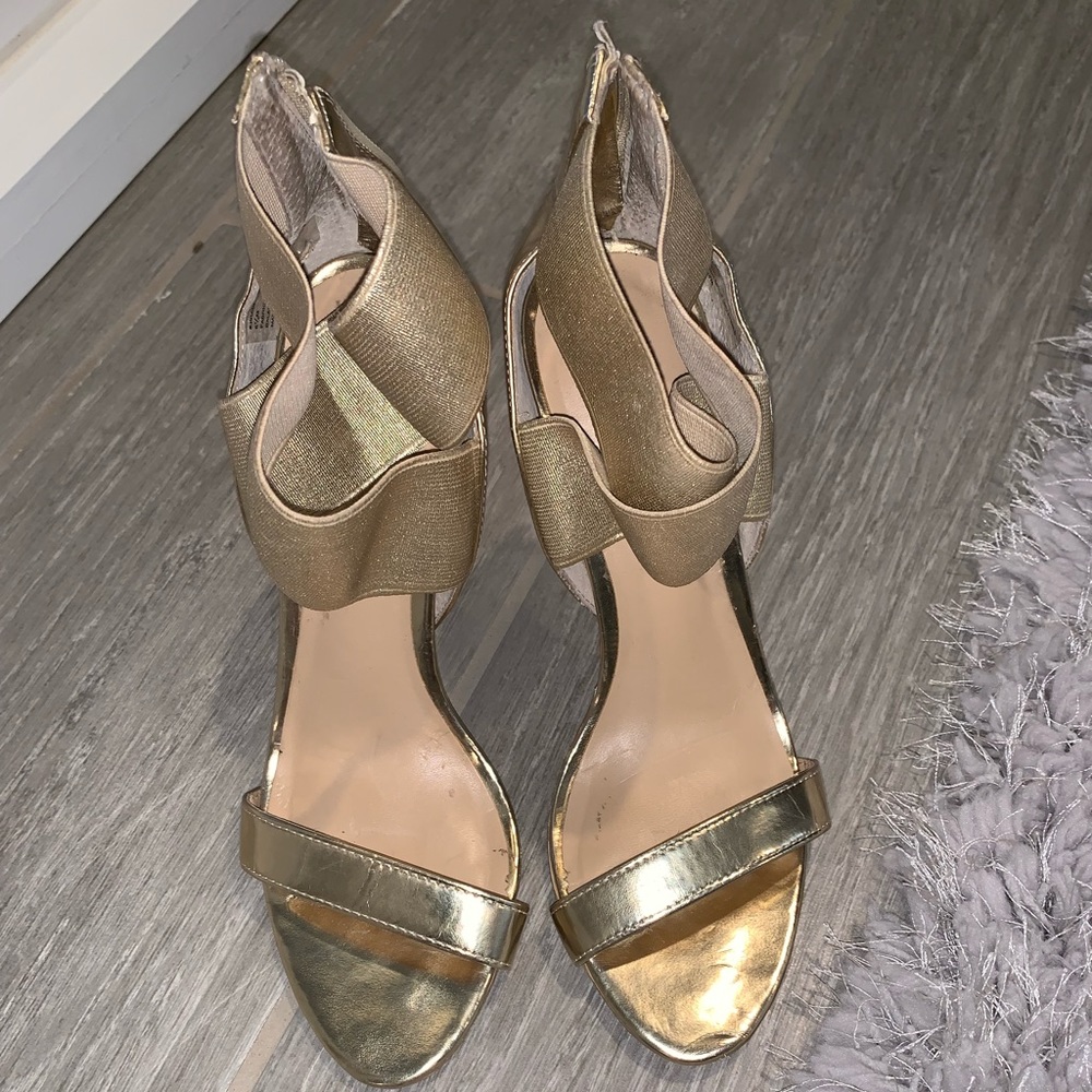 Gold strappy high heels